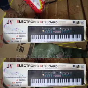 Photo - Brand Electronic Keyboard With Microphone