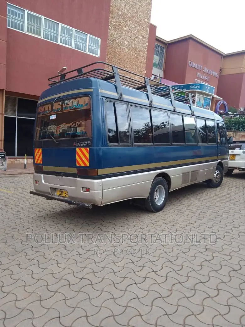 New Toyota Coaster 2003 Grey for Hire Per Day