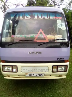 New Toyota Coaster 2003 Grey for Hire Per Day
