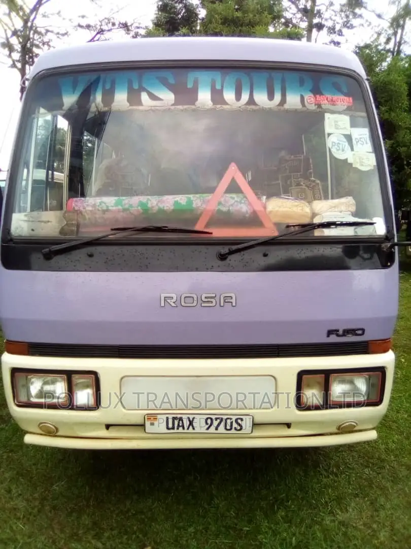 New Toyota Coaster 2003 Grey for Hire Per Day