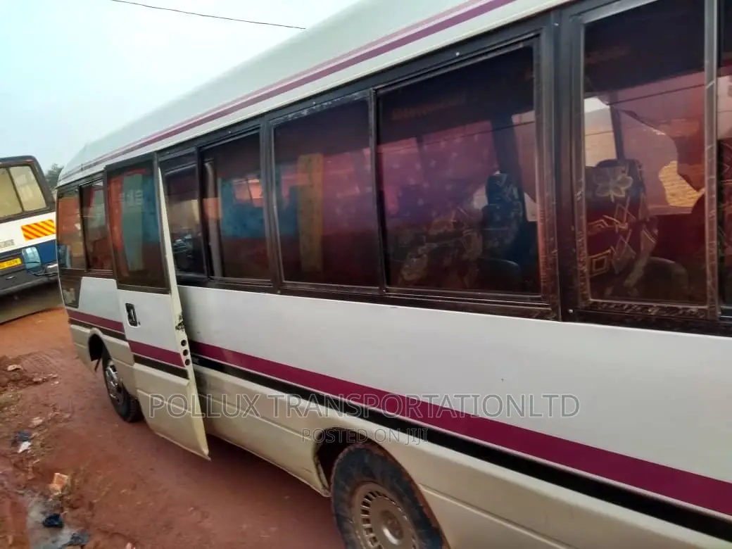 New Toyota Coaster 2003 Grey for Hire Per Day