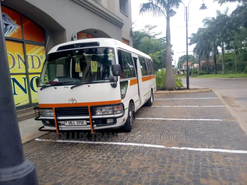 New Toyota Coaster 2003 Grey for Hire Per Day