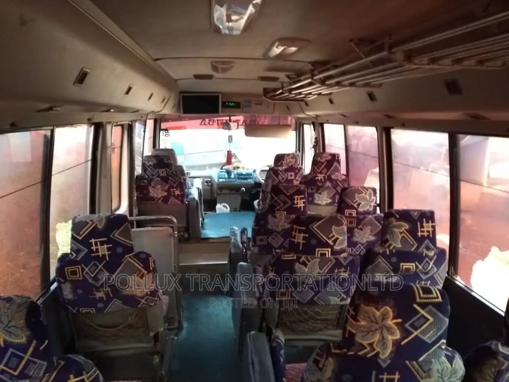 New Toyota Coaster 2003 Grey for Hire Per Day