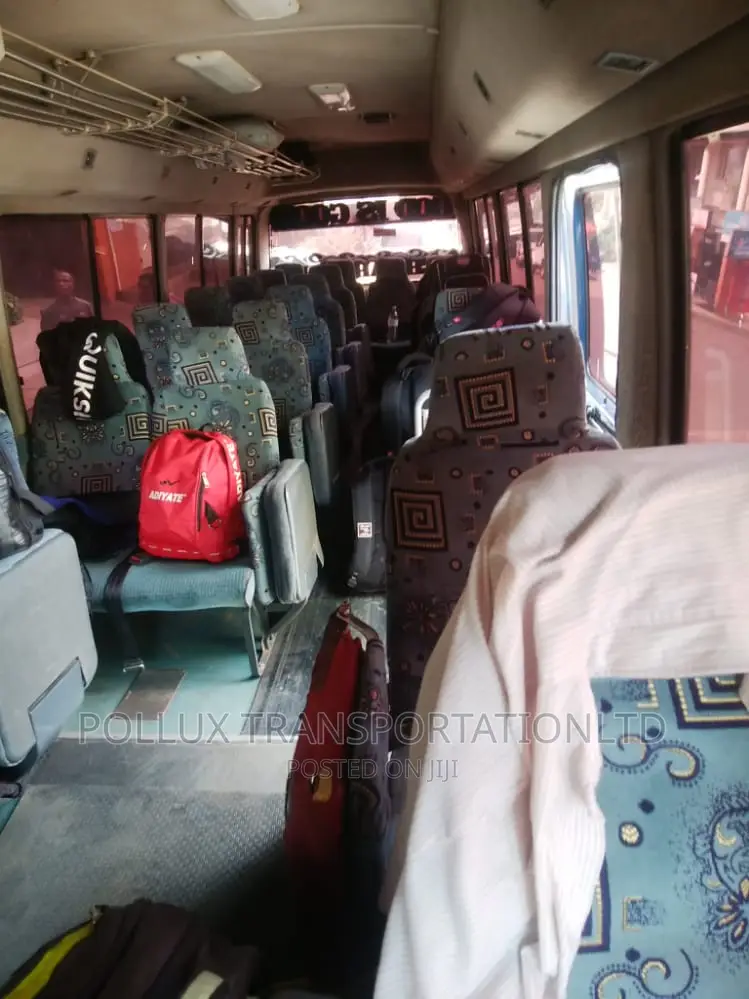 New Toyota Coaster 2003 Grey for Hire Per Day