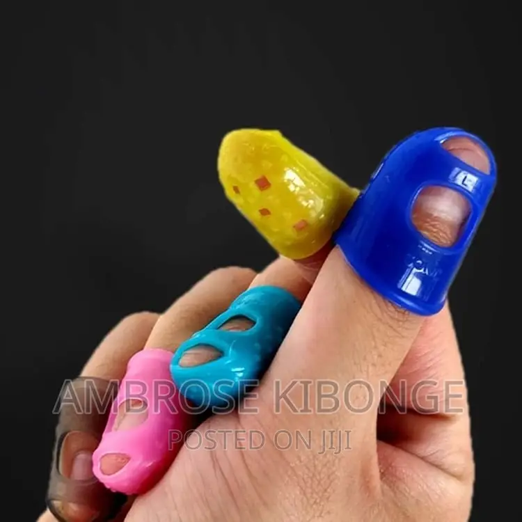 4pcs Guitar String Fingertip Guard Protector Silicone Press.