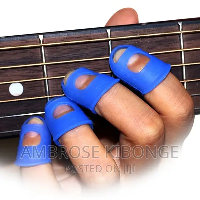 4pcs Guitar String Fingertip Guard Protector Silicone Press.