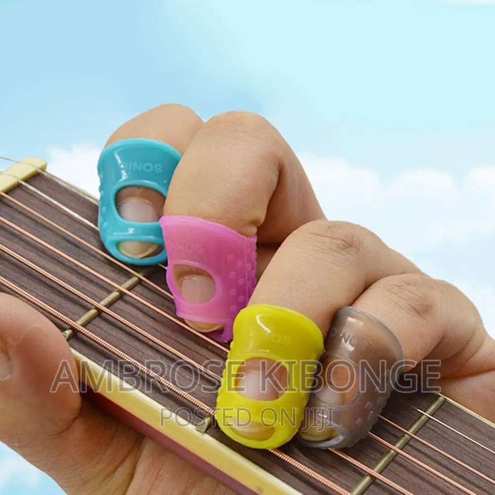 4pcs Guitar String Fingertip Guard Protector Silicone Press.