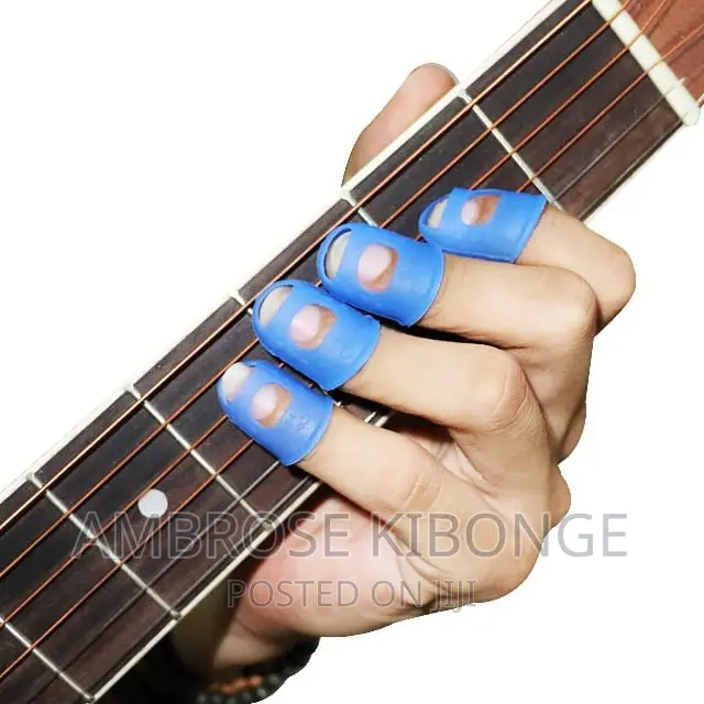4pcs Guitar String Fingertip Guard Protector Silicone Press.