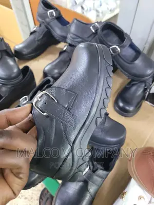 Photo - Kid's Black Shoes.