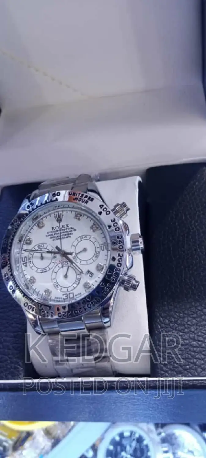Silver Rolex Day-Tona Watch