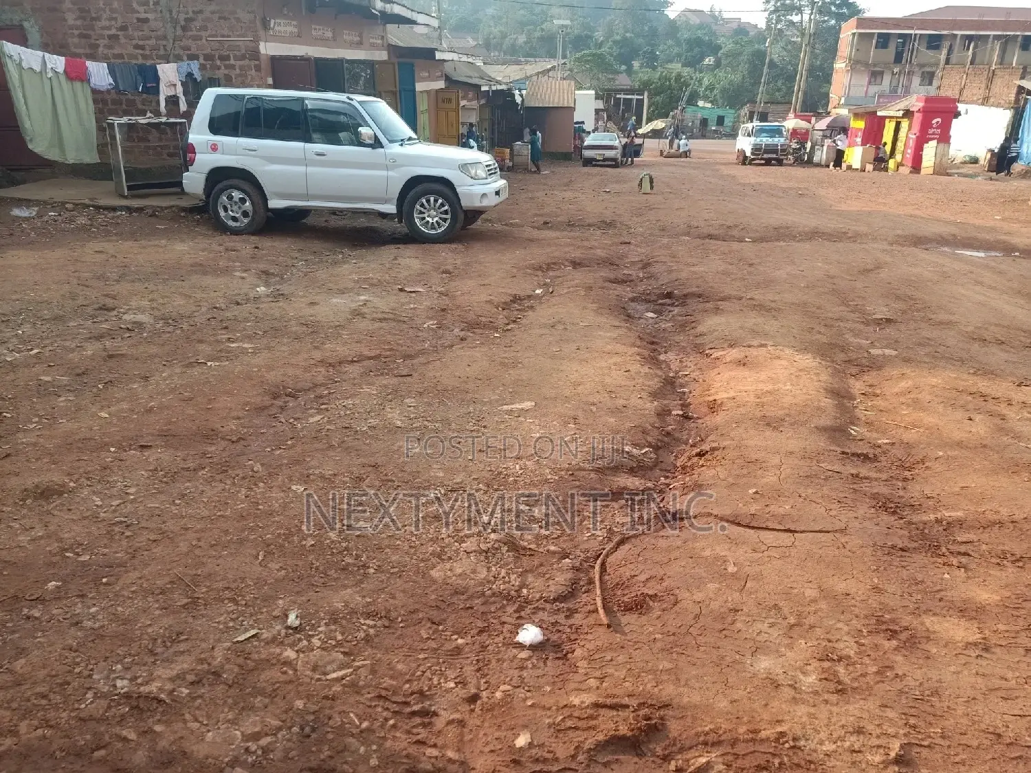 Acre of Land on Main Road in Kyengera Town.