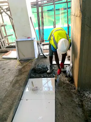 Photo - Fixing Tiles in Korido