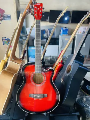 Photo - Electric Strong String Acoustic Guitar