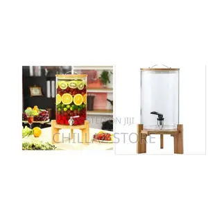 Glass Juice Dispenser With Wooden Stand.