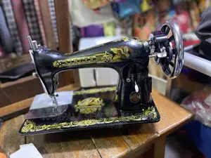 New Singer Sewing Machines With Its Stand