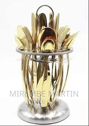 24 Pieces of Plain Cutlery (Forks,Spoons Knives)And Stand