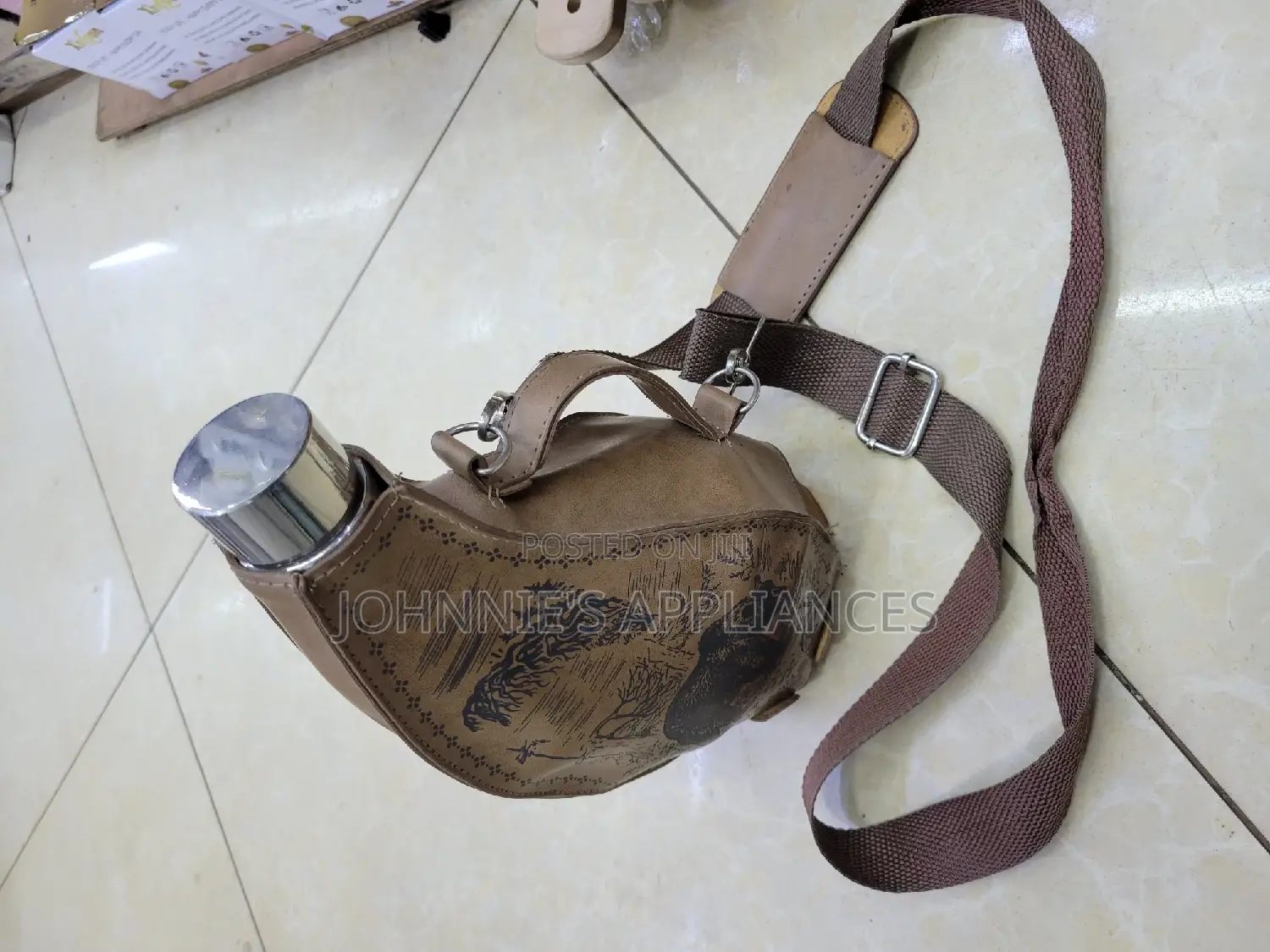 Stainless Steel Whiskey Bottle With Its Leather Bag
