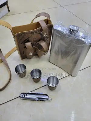 Stainless Steel Whiskey Bottle With Its Toti Glasses