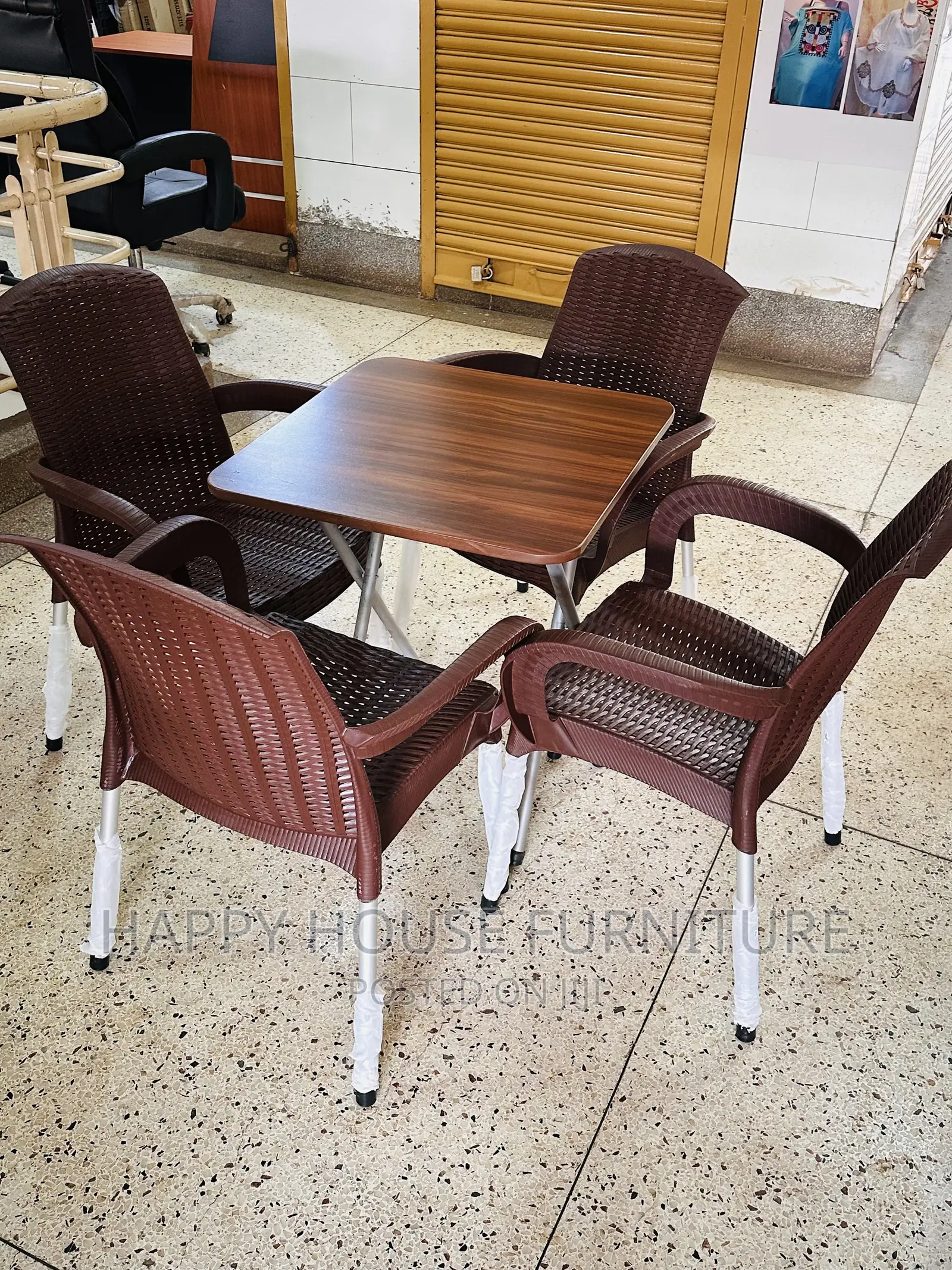 Table and 4 Plastic Chairs