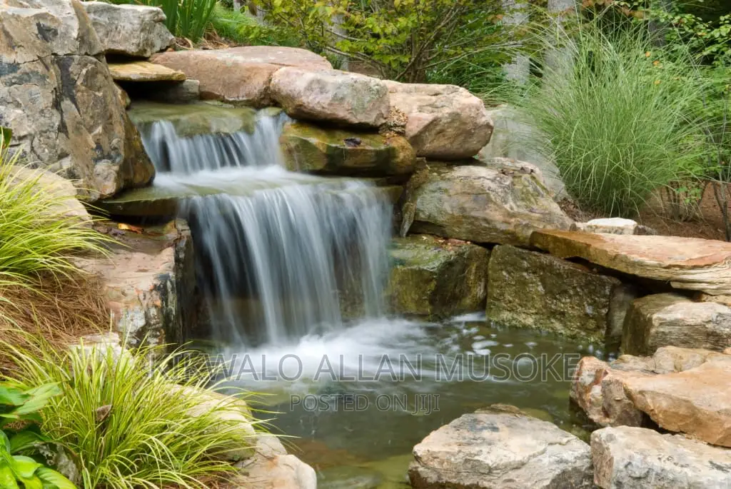 Waterfall, Fountain, Antique Bolders, Rock Garden Services.