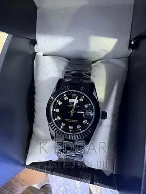 Black Rolex Watch in a Box