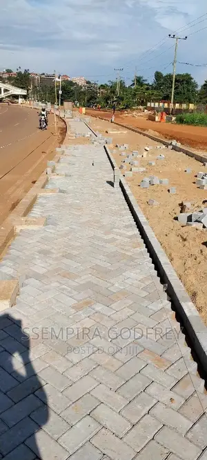 We Lay Pavers in Walkways Highways and Compounds