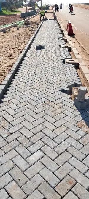 We Lay Pavers in Walkways Highways and Compounds