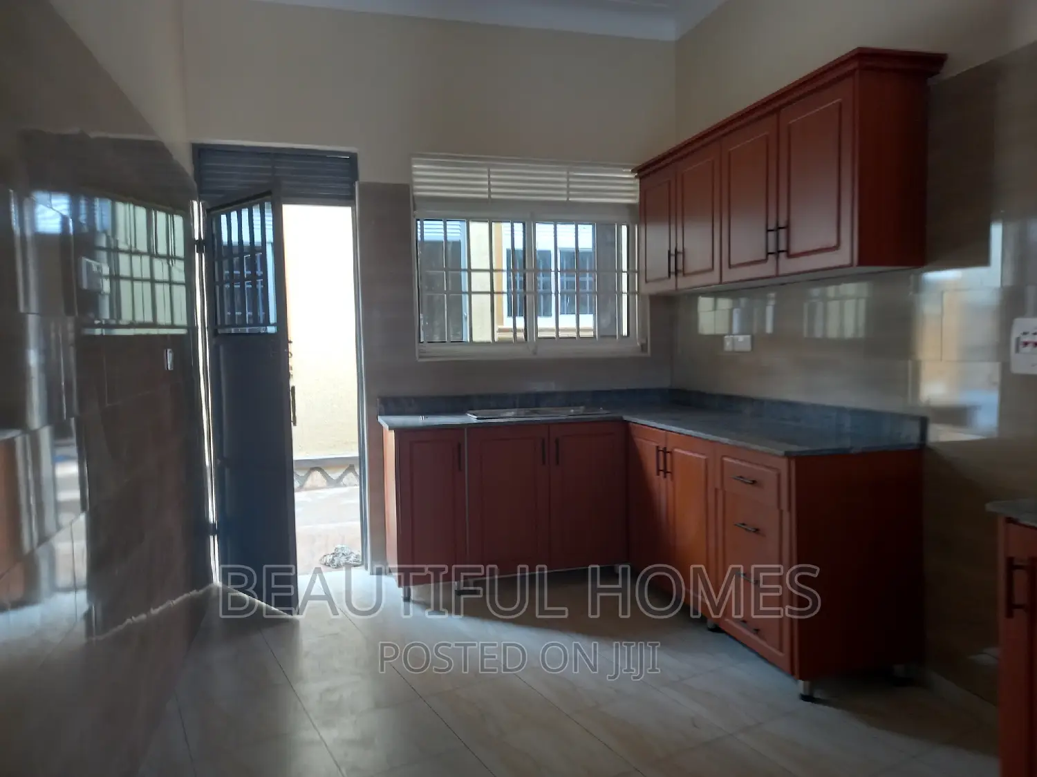 Furnished 4bdrm Bungalow in Kira for sale