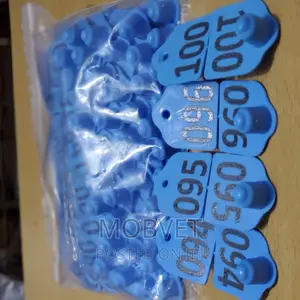Double Eartags Numbered Blue Goats *