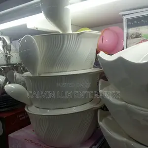 Ceramic Dishes With Serving Spoons