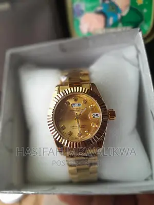 Golden Rolex Ladies Watch With a Gift Box