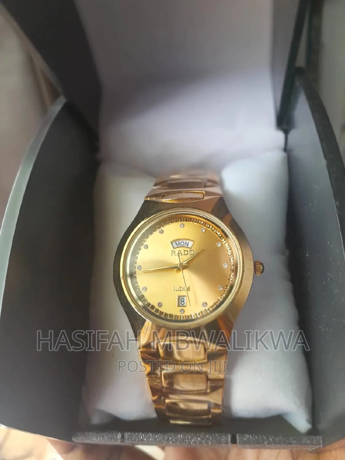 Golden Rado Watch With a Gift Box