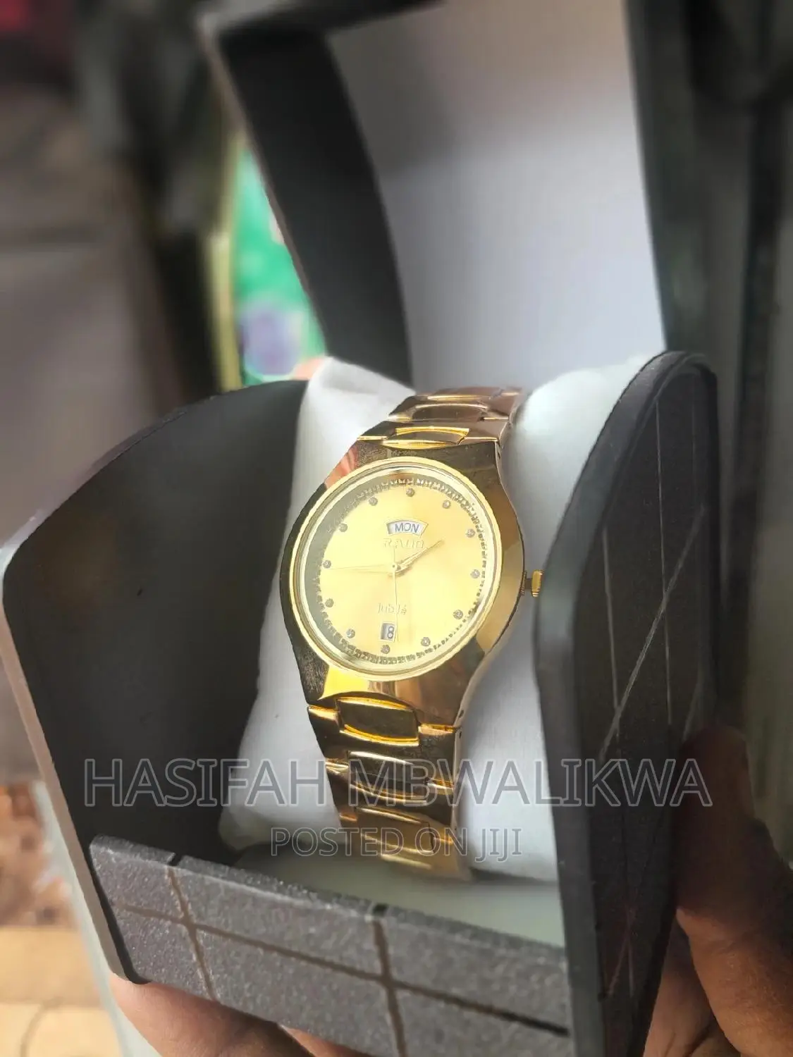 Golden Rado Watch With a Gift Box