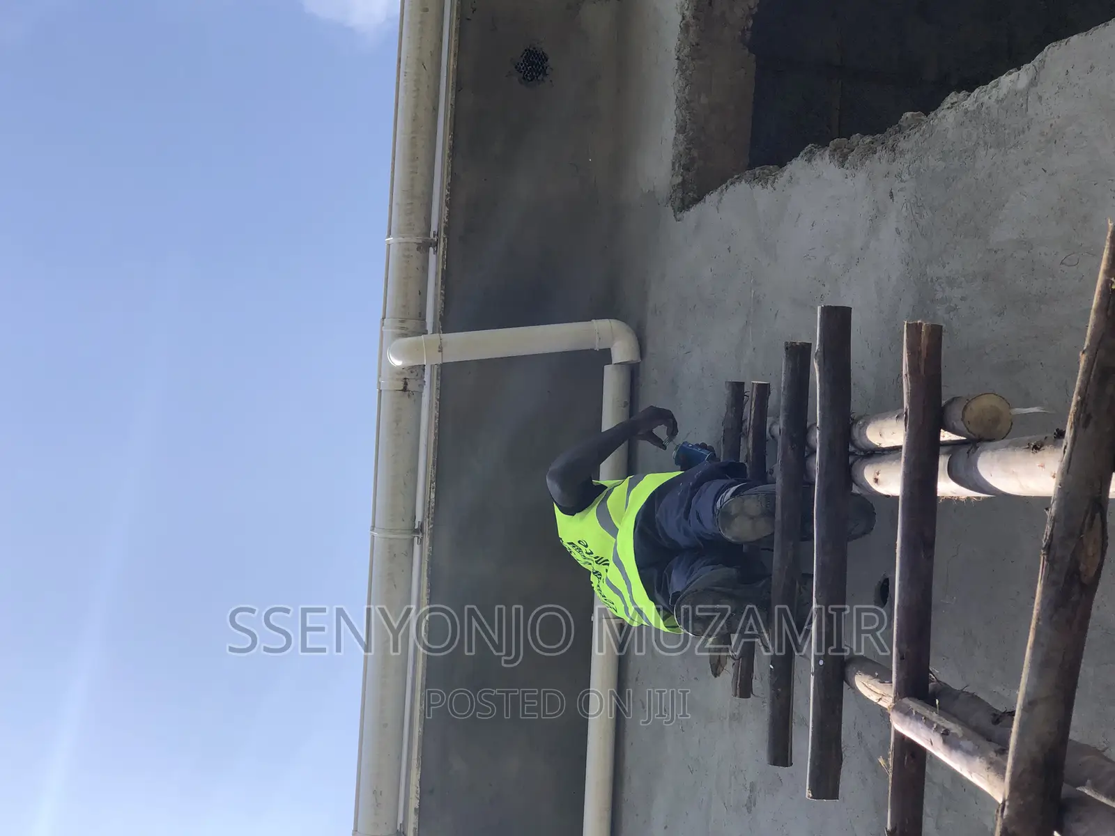 Laying of Water Gutters on Flat House