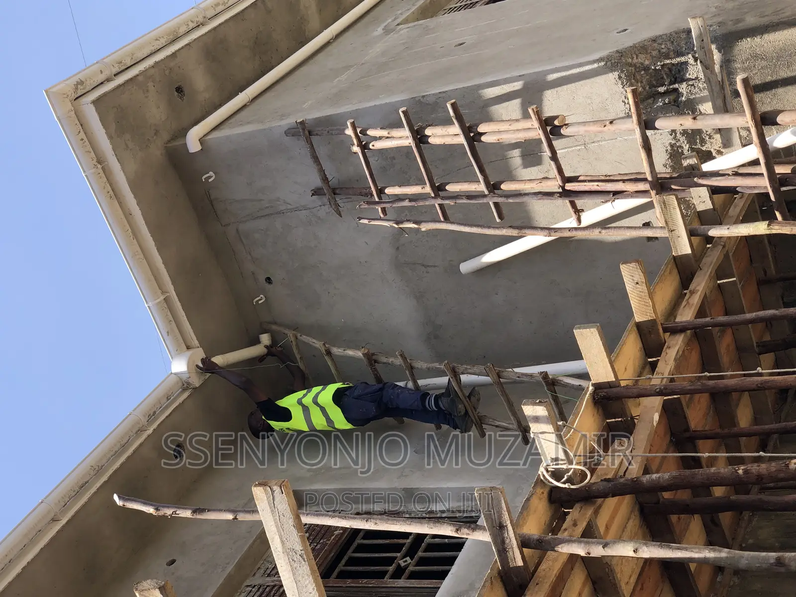 Laying of Water Gutters on Flat House