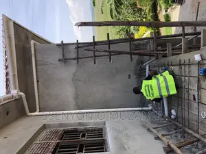Laying of Water Gutters on Flat House