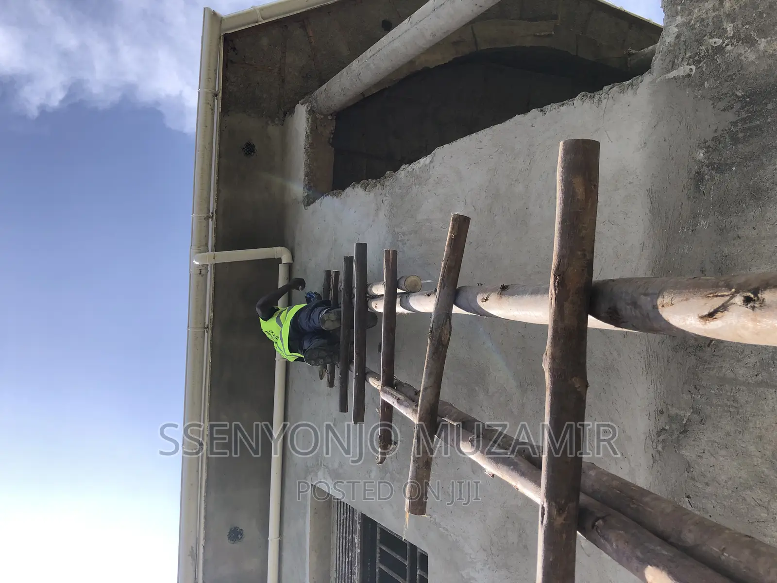 Laying of Water Gutters on Flat House