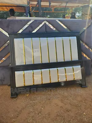 White Leather Bed With Gold Sticker
