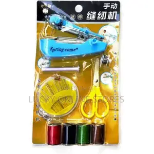 Photo - Hand Held Sewing Machine