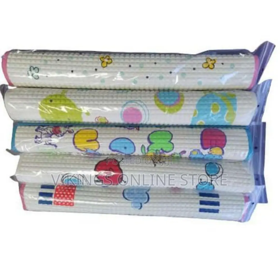Baby Rubber Urine Mat - Color Pattern May Vary