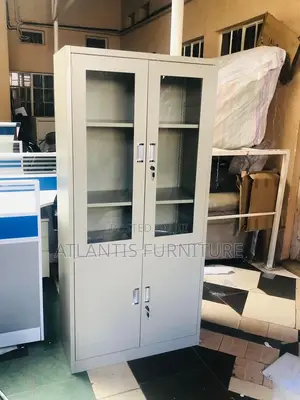 Metallic Cabinet With Movable Shelves.