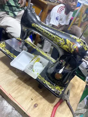 Original Singer Sewing Machines With the Stand
