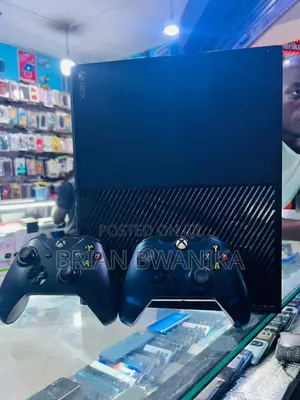 Xbox One With Pads and Games