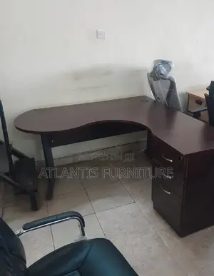 Photo - L Shape and Metallic Legs Table.
