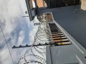 Electric Fence System With Razor Wire, Uganda