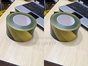 Brack And Yellow Barricade Tape