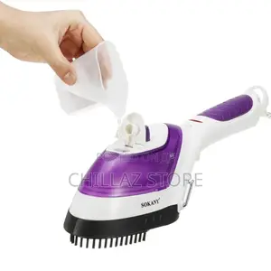 Steamer With Brush and Measuring Cup