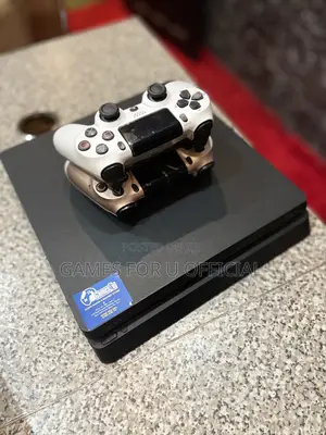 Ps4 Slim Unchipped Uk Used With Two Game Pada at 8