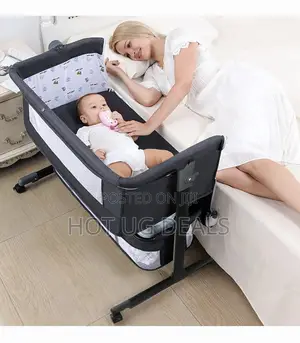 Photo - Baby Bassinet Bedside Sleeper Crib With Storage Basket