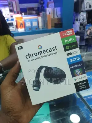 Photo - Chrome Cast TV Streaming Device by Google